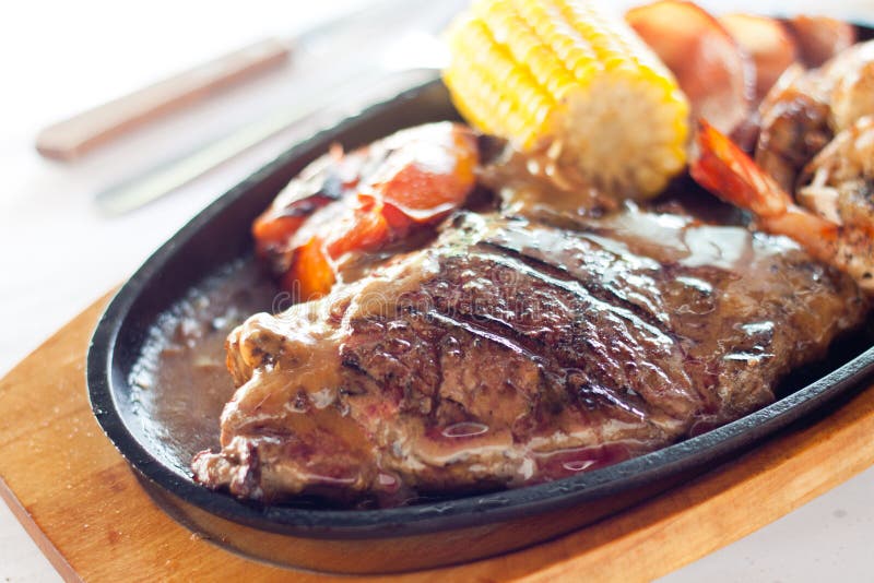 Sizzling Sisig on a Hot Plate: A Culinary Delight for Chefs