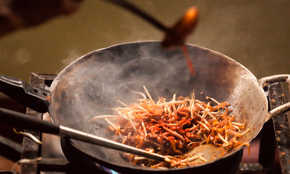 How to Re-Season a Carbon Steel Wok for Best Results?