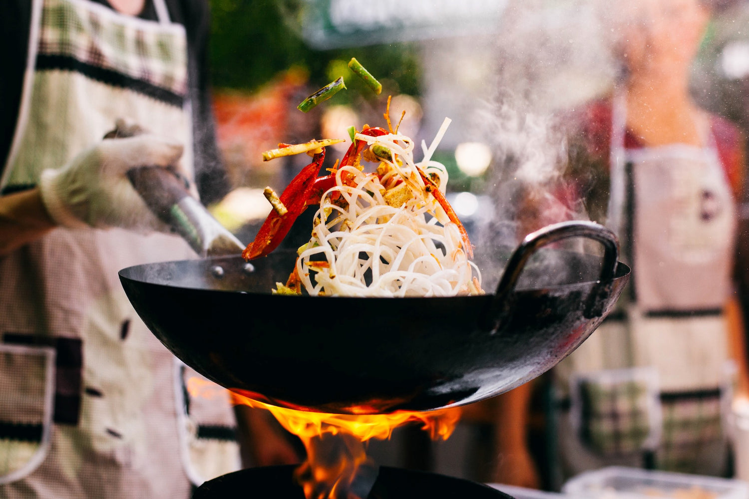 How is a Wok Different from a Frying Pan in Cooking?